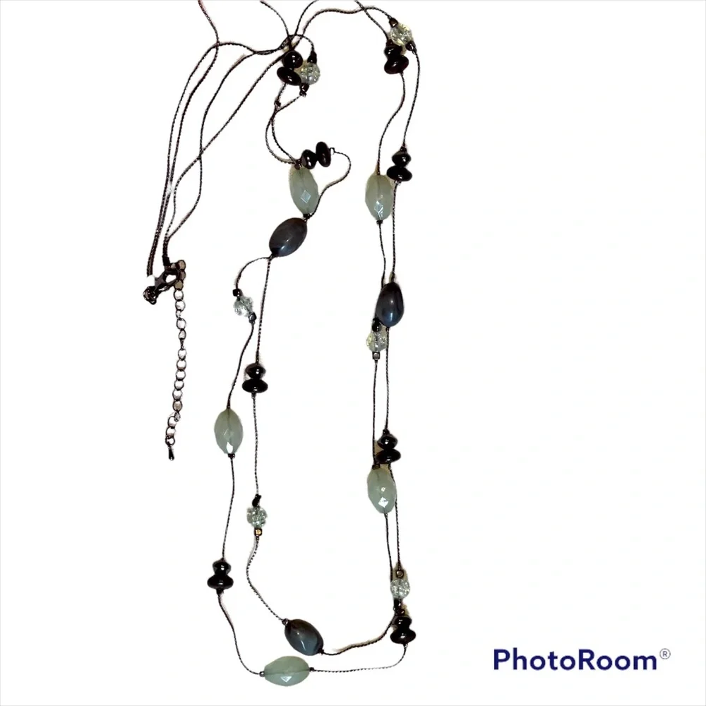 Double stranded designer necklace with multi faceted stones in euc